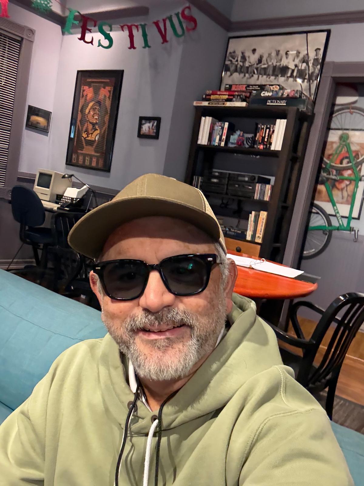 Abhay Dharmadhikari in a cap and sunglasses